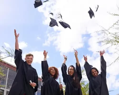 student-throwing-their-graduation-hats